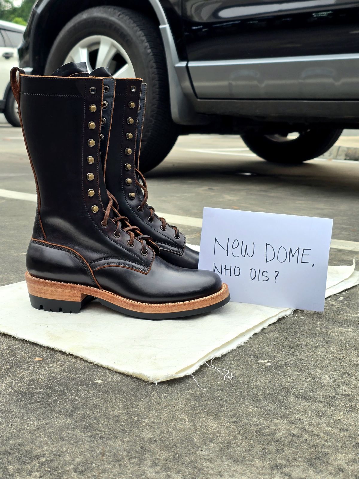 Photo by julio_archieve on October 5, 2025 of the Fortis Boots Logger Boots in Indonesian Red Brown Pull Up Overdyed Black.