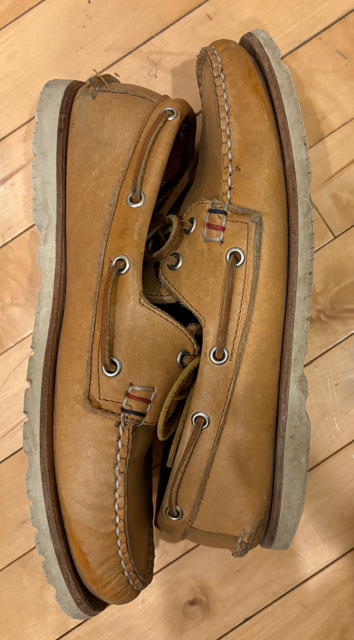 Thumbnail of review: Stiff slippers that soften with every wear