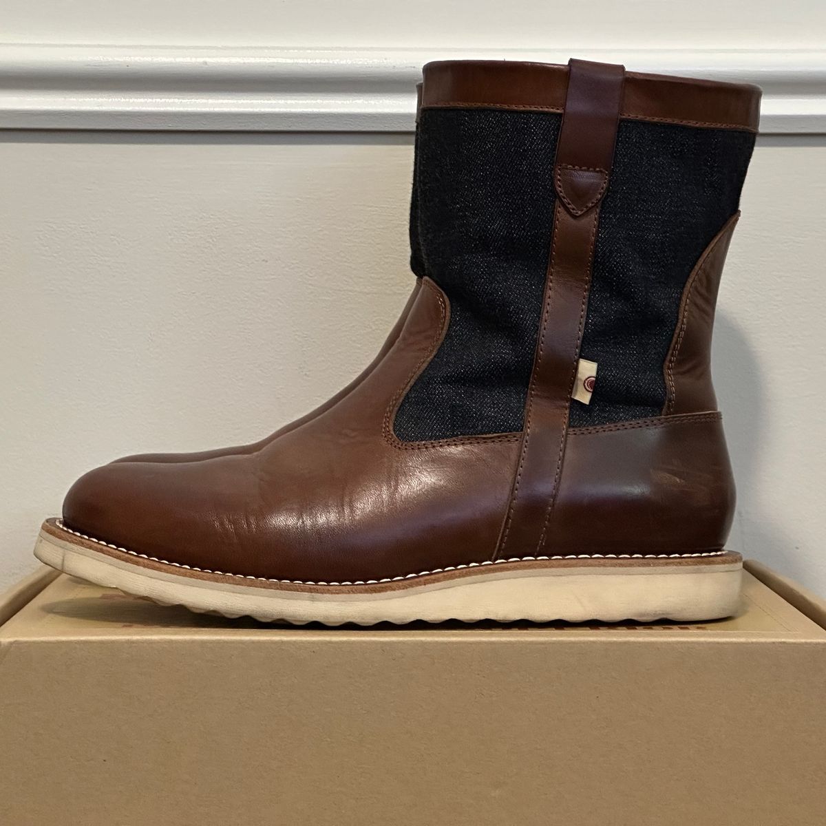 Photo by pMattp on December 2, 2024 of the Monad x Momotaro Farmer Boots in Tempesti Ambra Elbamatt Liscio.