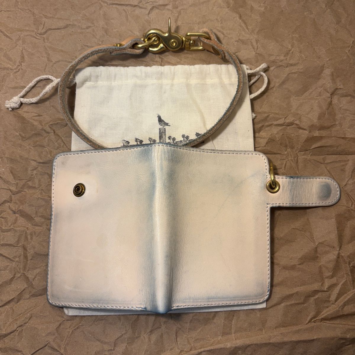 Photo by TastefulGent on November 1, 2025 of the Pigeon Tree Mid-Wallet Snap Bifold Version 3 in Unknown Natural Veg Tan.