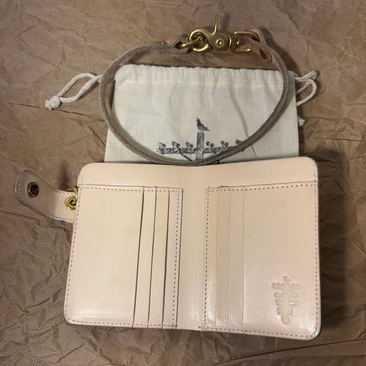 Photo by TastefulGent on November 1, 2025 of the Pigeon Tree Mid-Wallet Snap Bifold Version 3 in Unknown Natural Veg Tan.