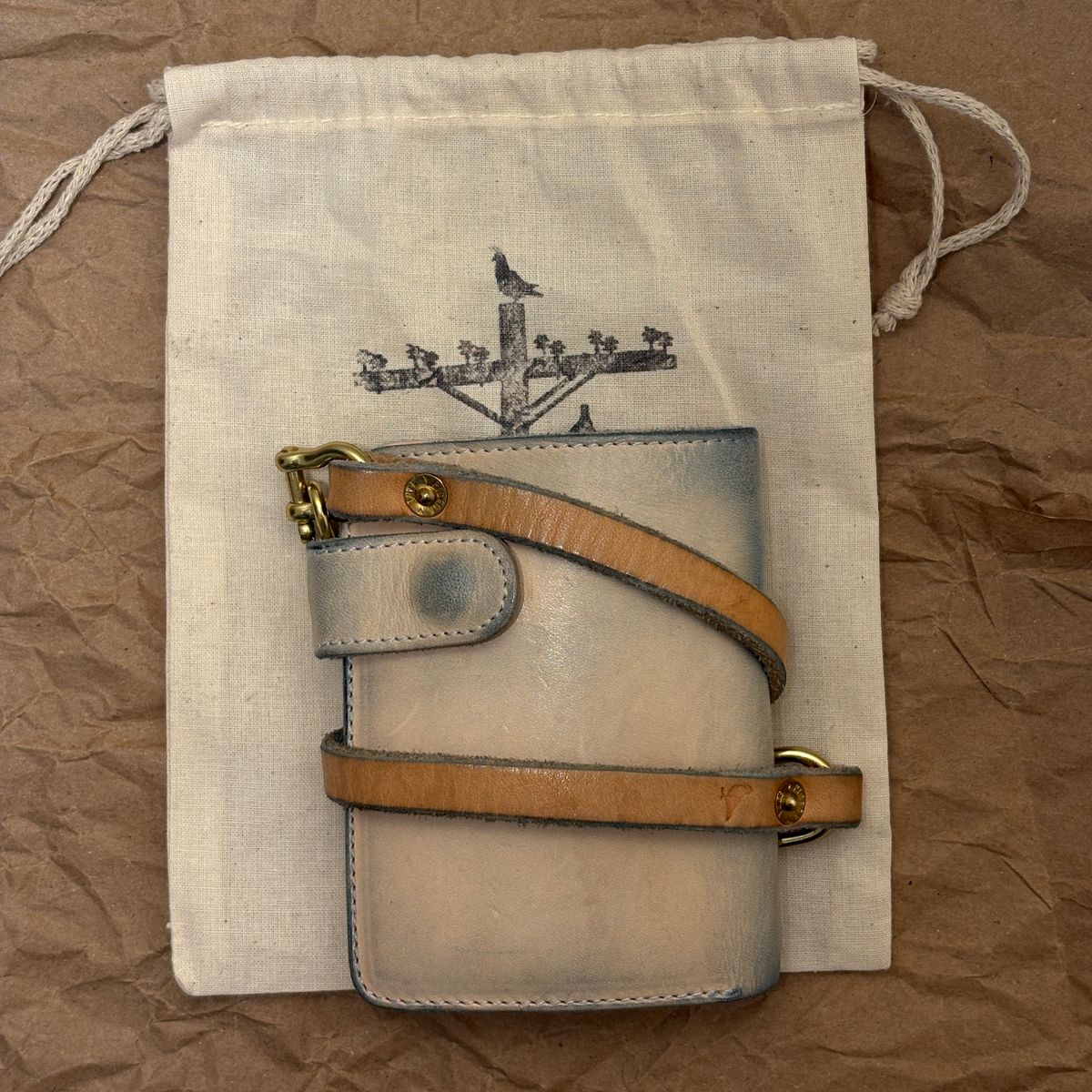 Photo by TastefulGent on February 1, 2026 of the Pigeon Tree Mid-Wallet Snap Bifold Version 3 in Unknown Natural Veg Tan.