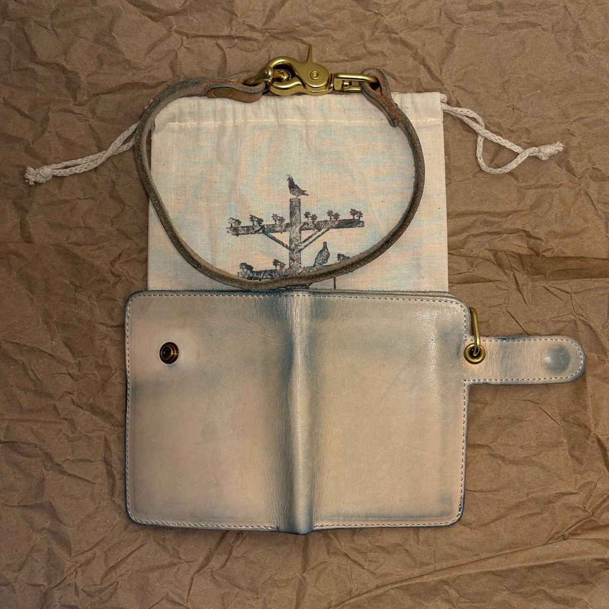 Photo by TastefulGent on March 2, 2026 of the Pigeon Tree Mid-Wallet Snap Bifold Version 3 in Unknown Natural Veg Tan.