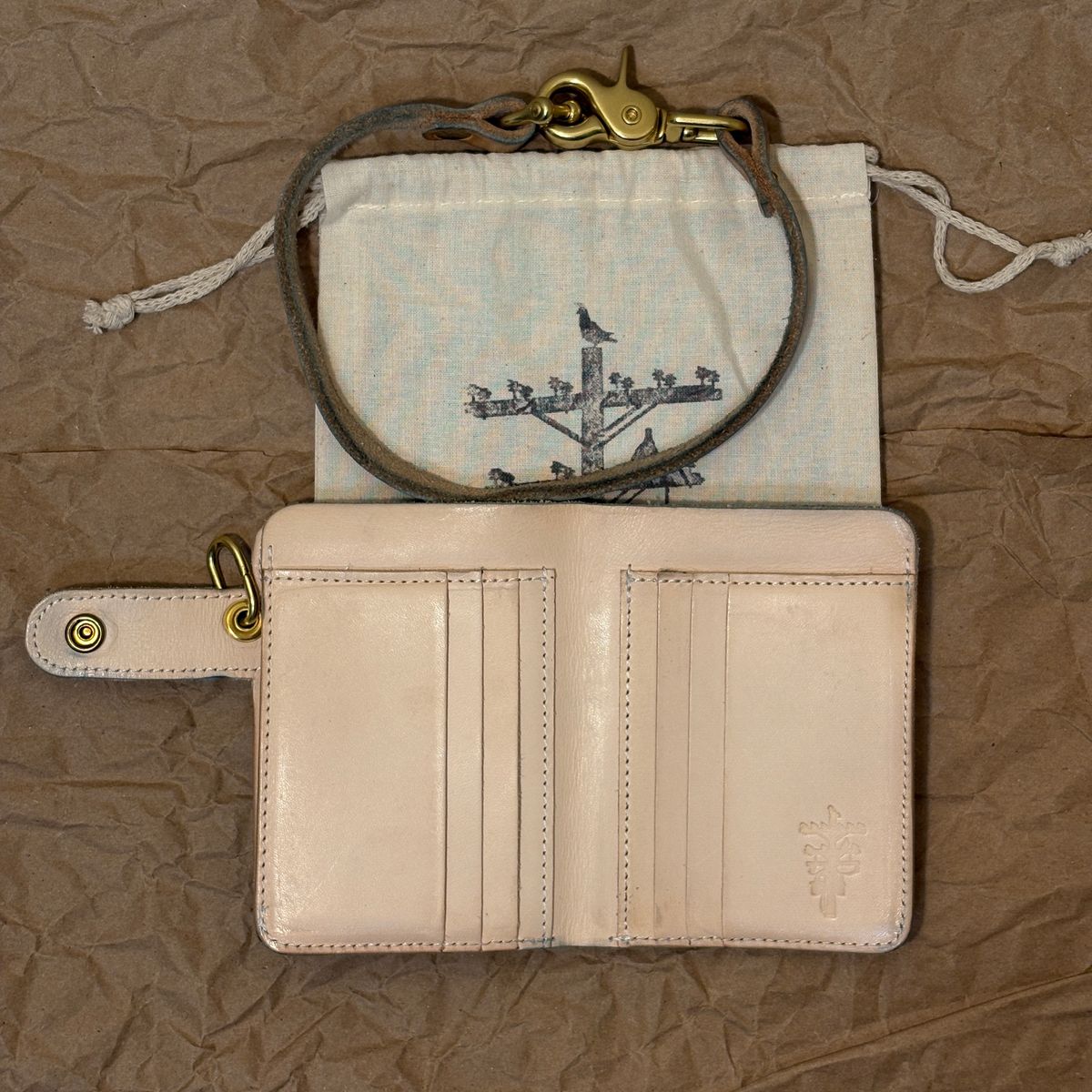 Photo by TastefulGent on March 2, 2026 of the Pigeon Tree Mid-Wallet Snap Bifold Version 3 in Unknown Natural Veg Tan.