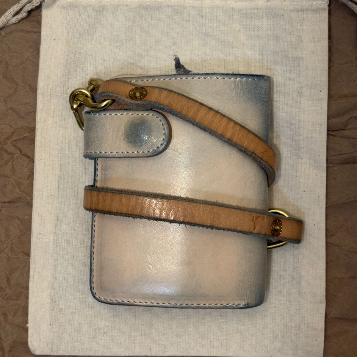 Photo by TastefulGent on March 2, 2026 of the Pigeon Tree Mid-Wallet Snap Bifold Version 3 in Unknown Natural Veg Tan.