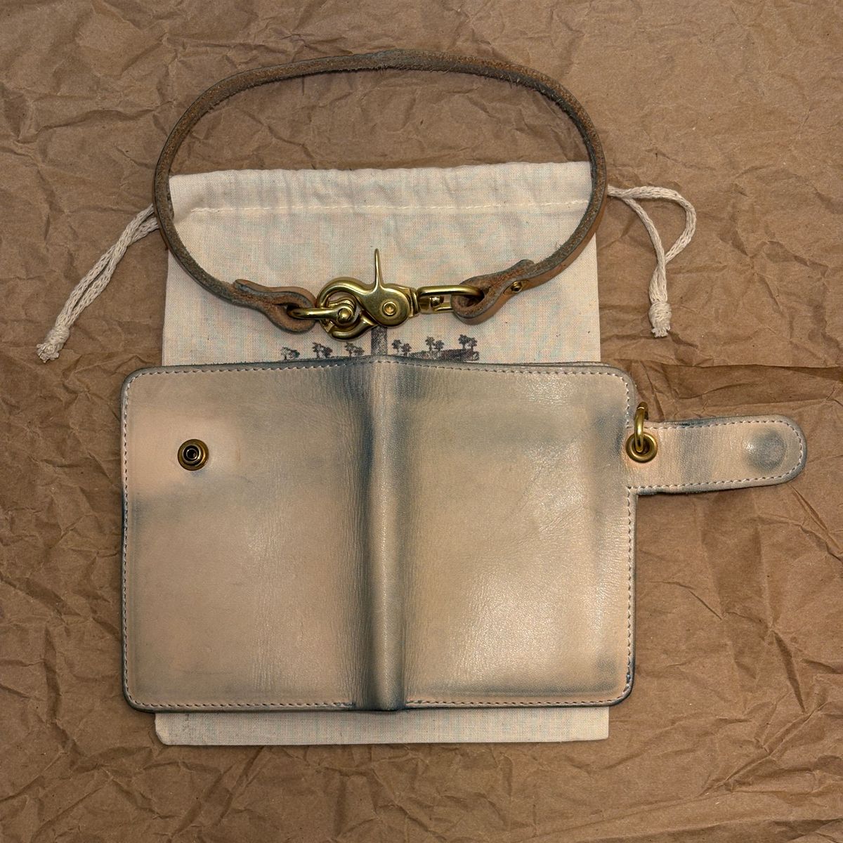 Photo by TastefulGent on April 5, 2026 of the Pigeon Tree Mid-Wallet Snap Bifold Version 3 in Unknown Natural Veg Tan.