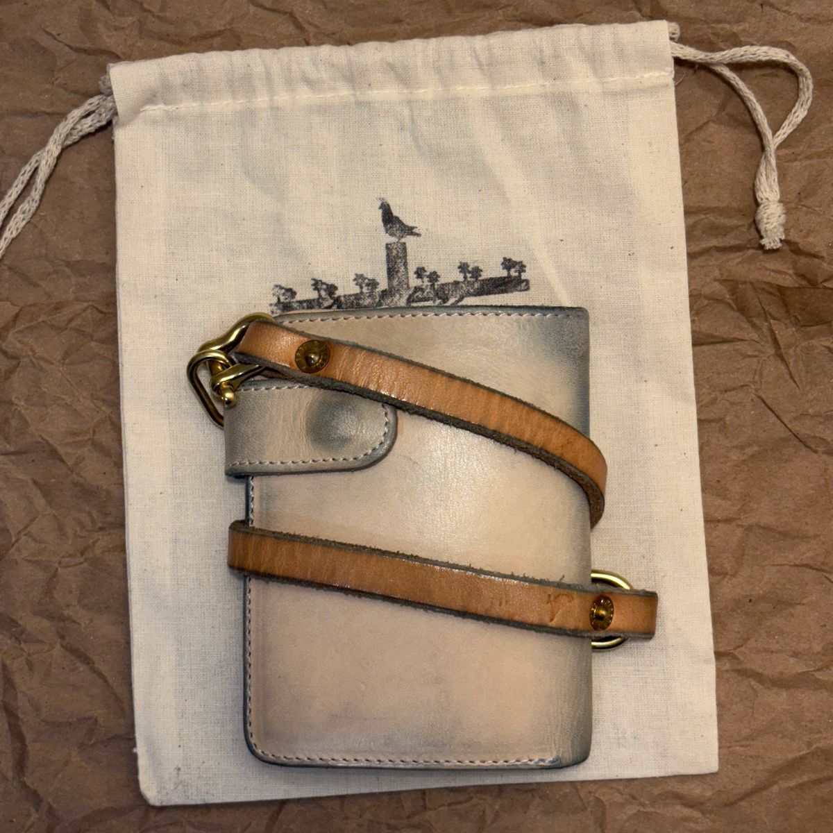 Photo by TastefulGent on April 5, 2026 of the Pigeon Tree Mid-Wallet Snap Bifold Version 3 in Unknown Natural Veg Tan.