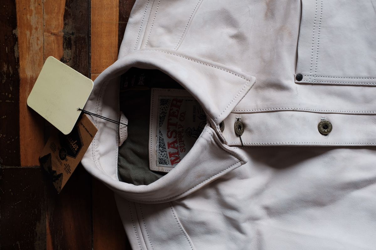Photo by denimwatchesboots on October 1, 2025 of the Master Supply Co Field Jacket in Veg-Tanned Natural Cowhide.