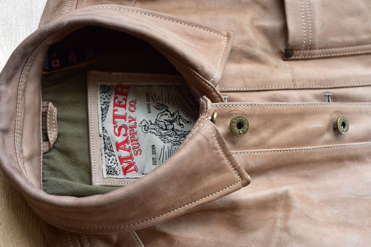 Photo by denimwatchesboots on November 1, 2025 of the Master Supply Co Field Jacket in Veg-Tanned Natural Cowhide.