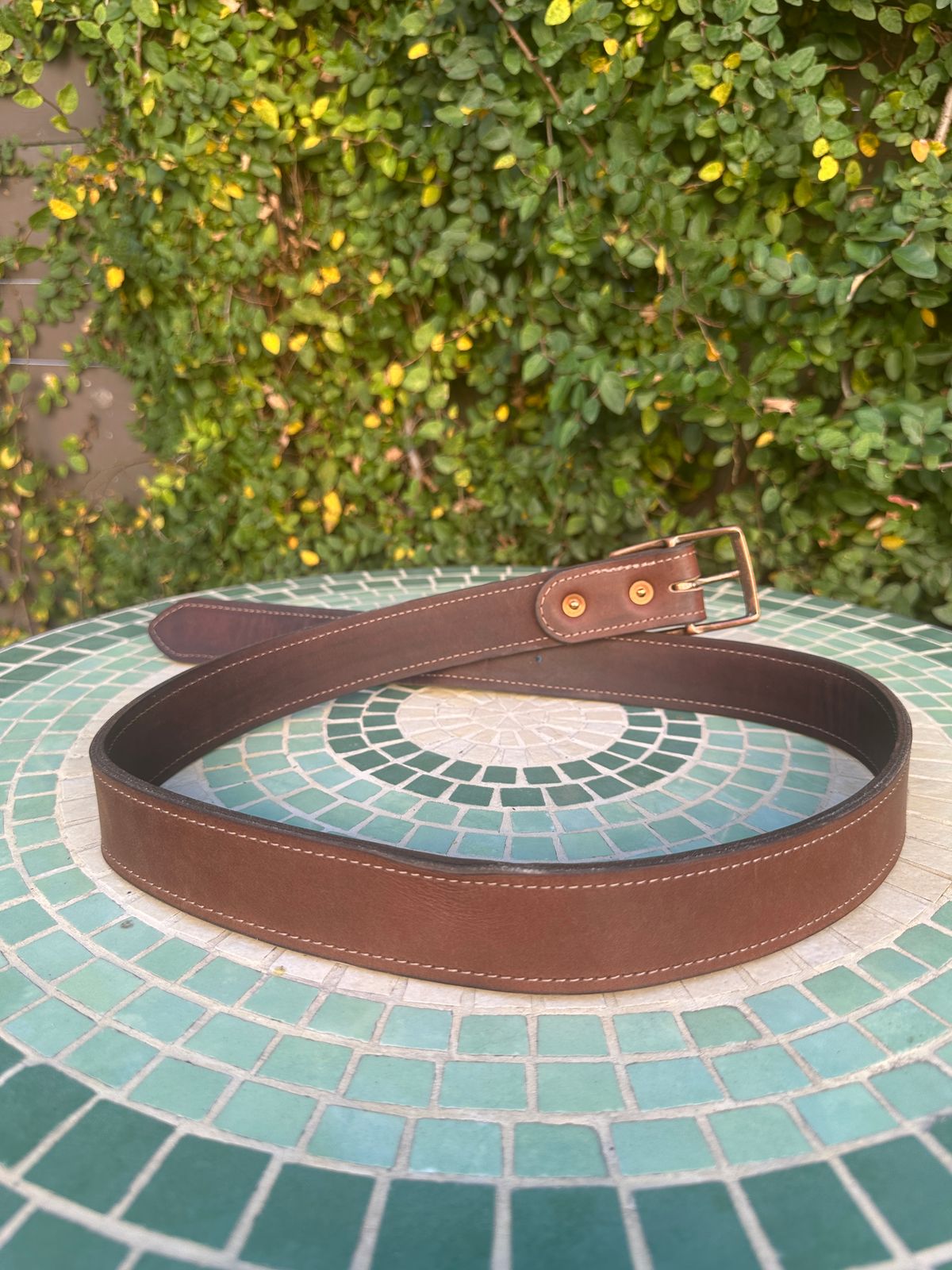 Photo by JB on December 5, 2025 of the North Star Leather 1.5 Inch Belt in S.B. Foot Amber Harness.