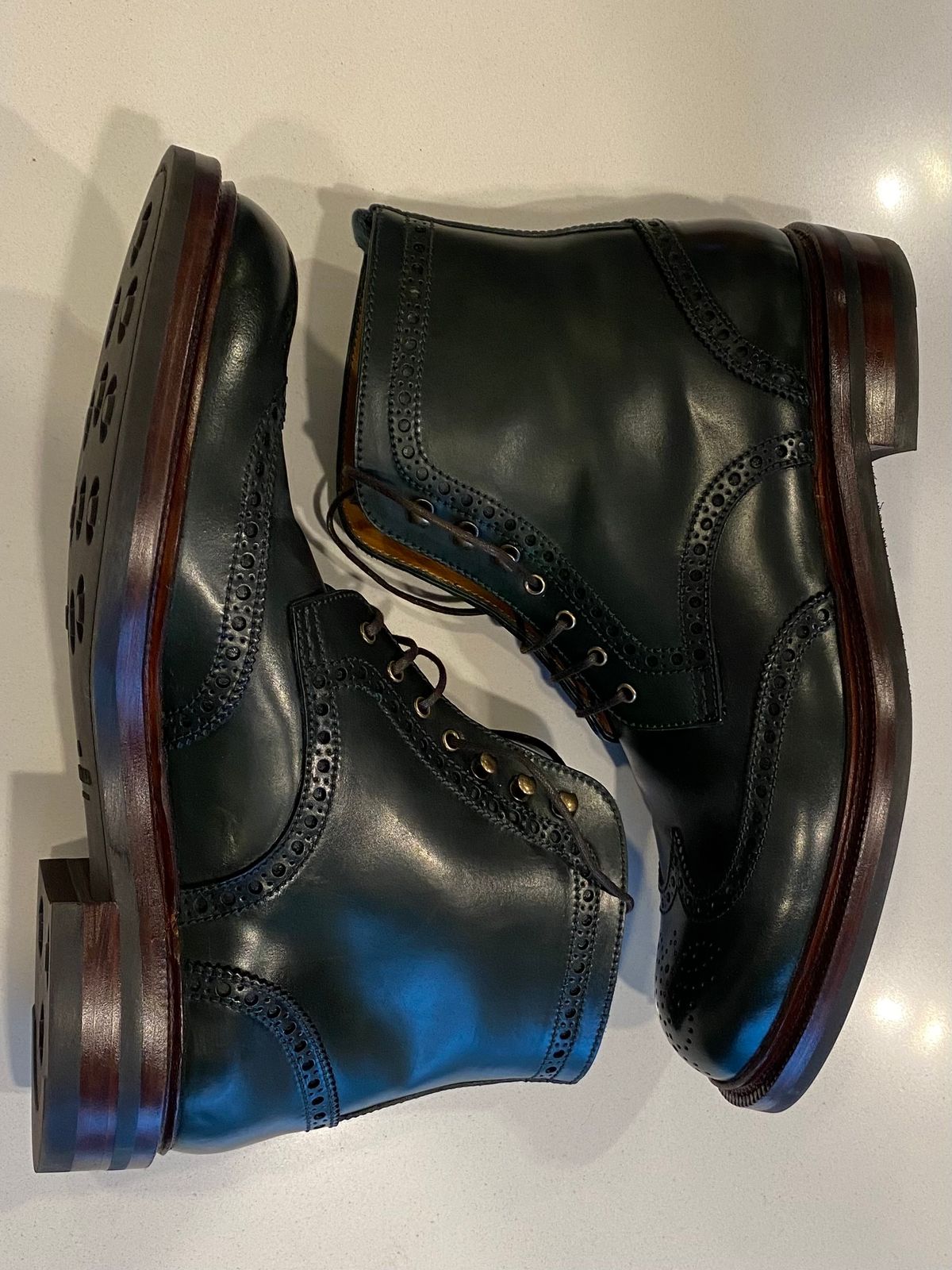 Photo by chris.8888 on March 15, 2025 of the Carmina Full-Brogue Jumper Boots 80277 in Horween Green Shell Cordovan.