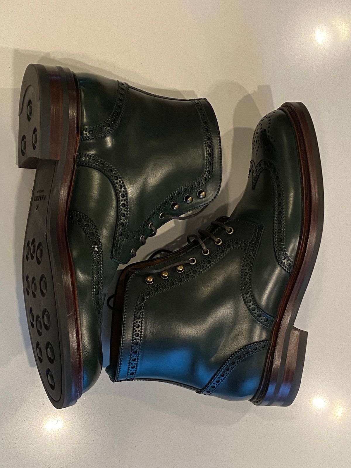 Photo by chris.8888 on March 15, 2025 of the Carmina Full-Brogue Jumper Boots 80277 in Horween Green Shell Cordovan.