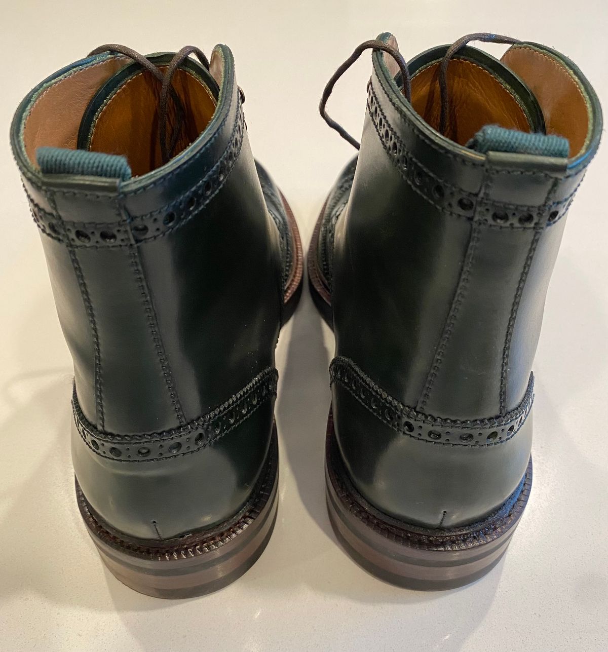 Photo by chris.8888 on March 15, 2025 of the Carmina Full-Brogue Jumper Boots 80277 in Horween Green Shell Cordovan.