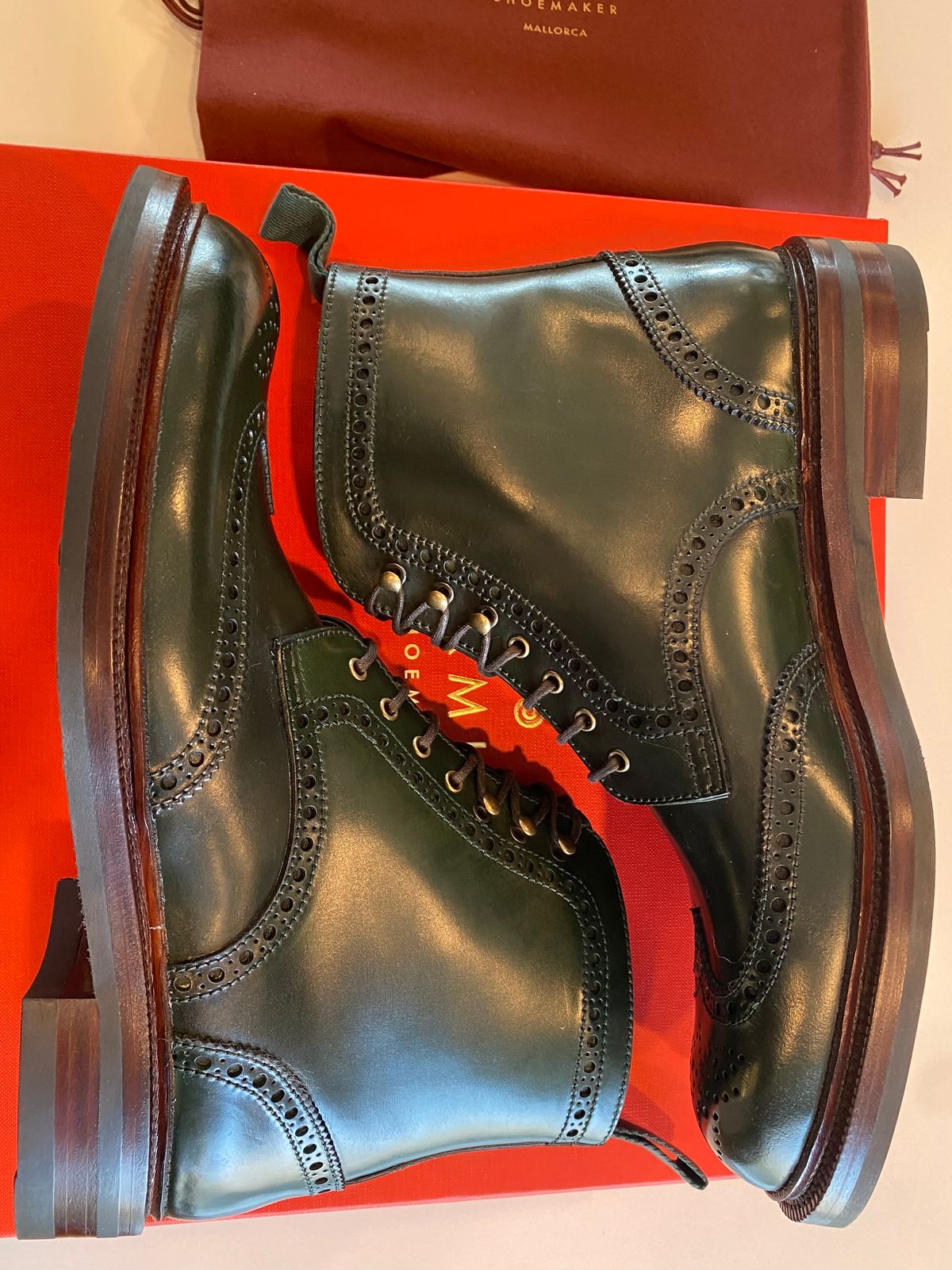 Photo by chris.8888 on March 12, 2025 of the Carmina Full-Brogue Jumper Boots 80277 in Horween Green Shell Cordovan.