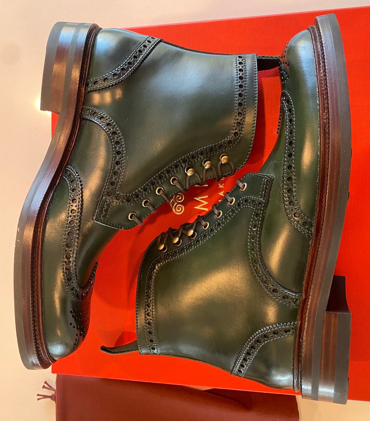 Photo by chris.8888 on March 12, 2025 of the Carmina Full-Brogue Jumper Boots 80277 in Horween Green Shell Cordovan.