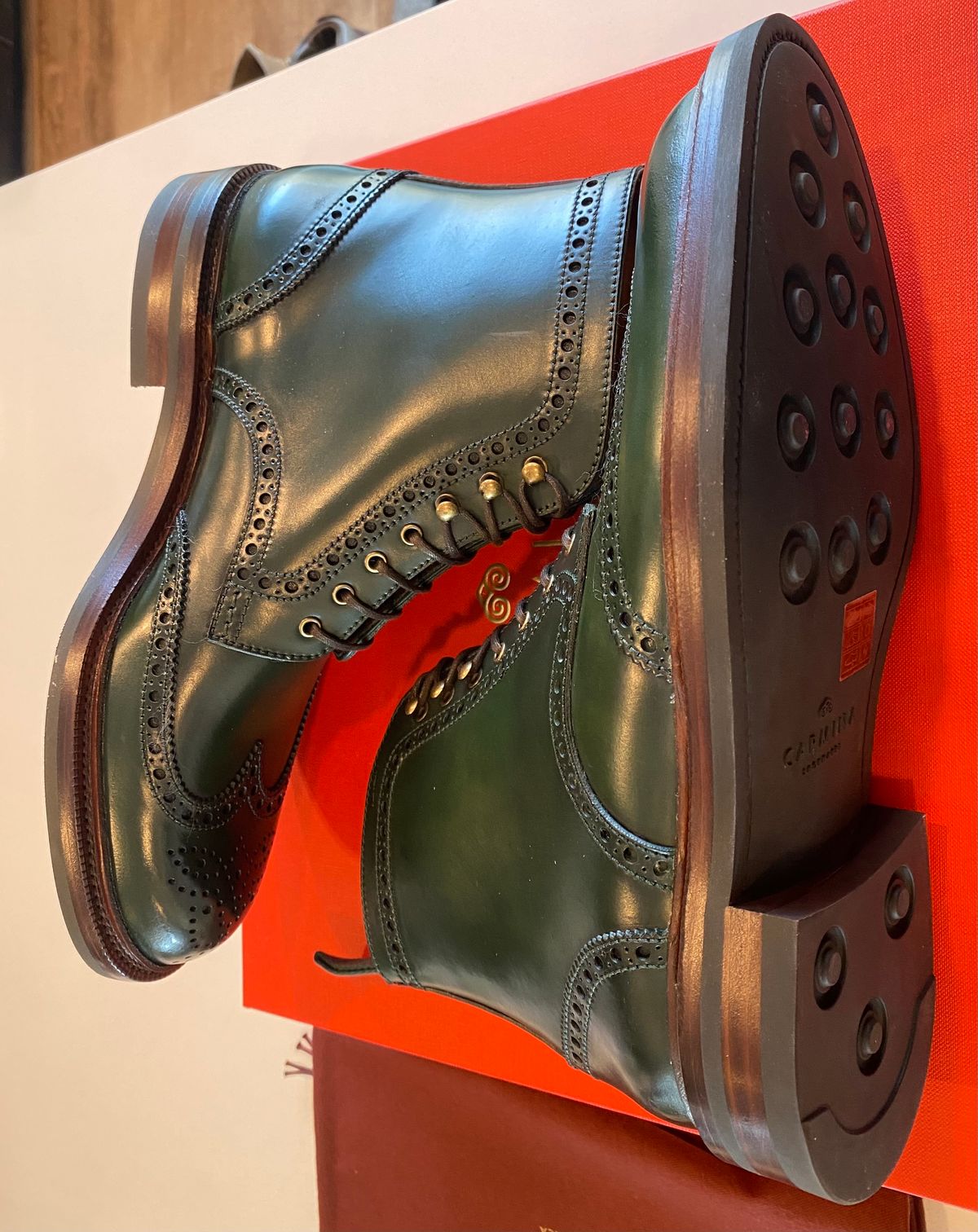 Photo by chris.8888 on March 12, 2025 of the Carmina Full-Brogue Jumper Boots 80277 in Horween Green Shell Cordovan.