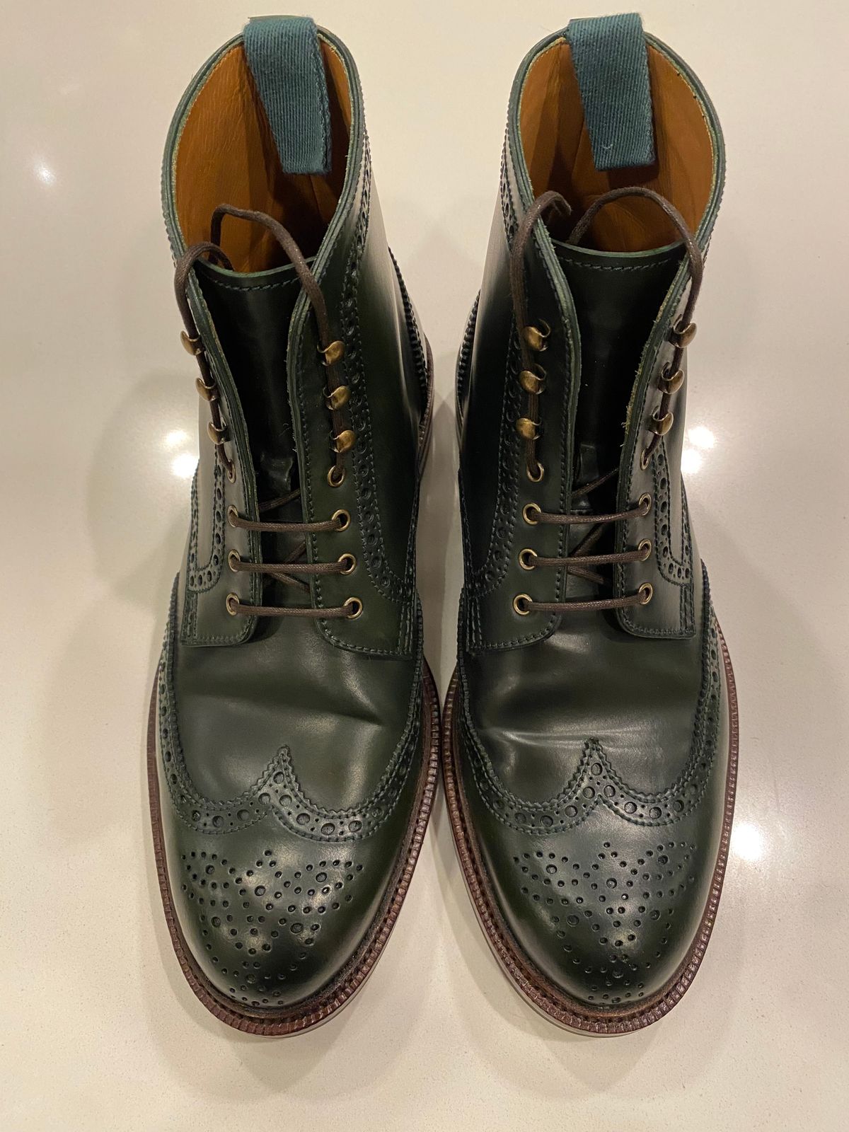 Photo by chris.8888 on June 11, 2025 of the Carmina Full-Brogue Jumper Boots 80277 in Horween Green Shell Cordovan.