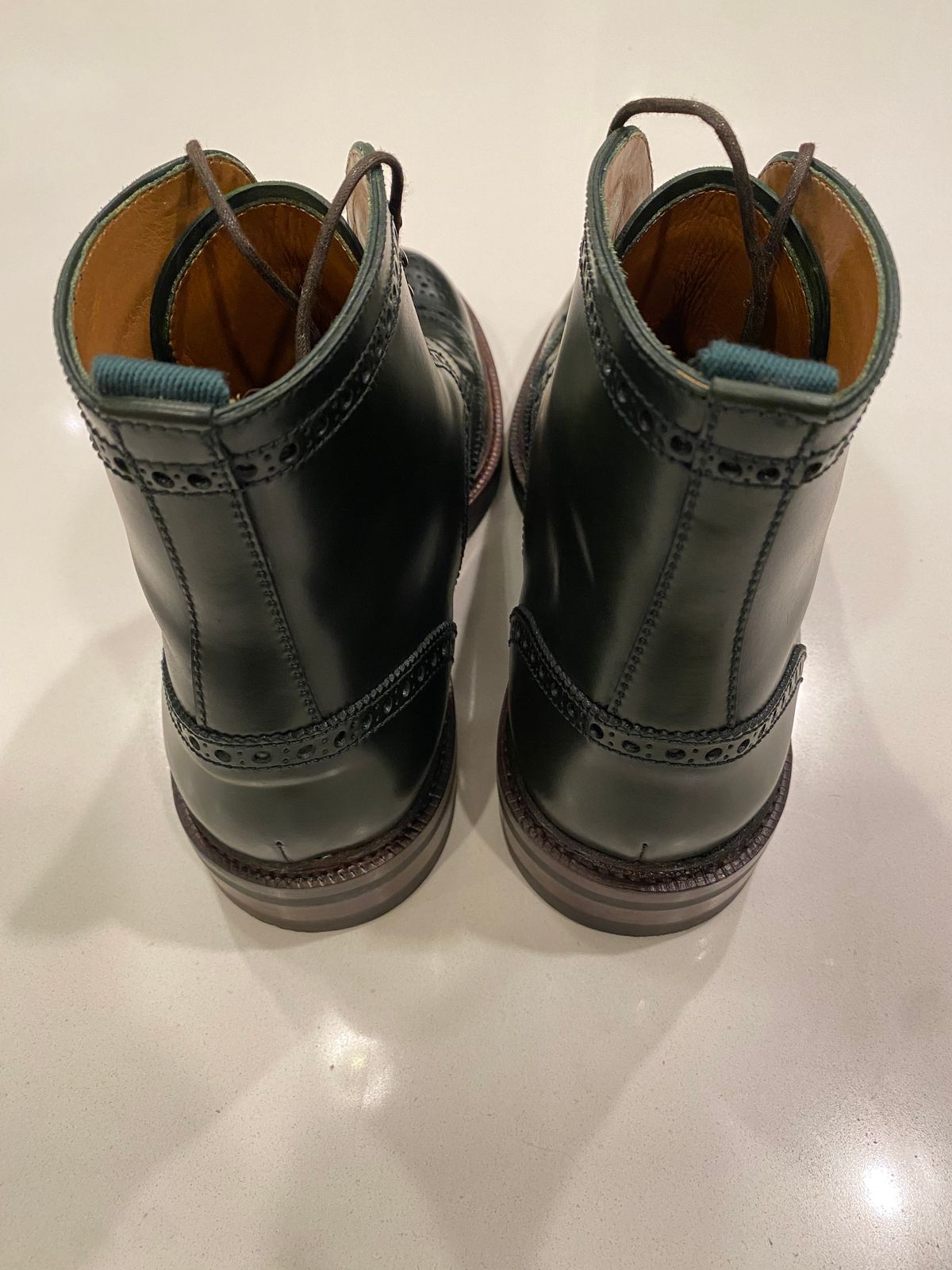 Photo by chris.8888 on June 11, 2025 of the Carmina Full-Brogue Jumper Boots 80277 in Horween Green Shell Cordovan.
