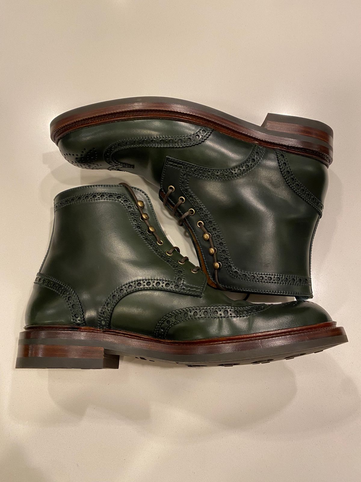 Photo by chris.8888 on June 11, 2025 of the Carmina Full-Brogue Jumper Boots 80277 in Horween Green Shell Cordovan.