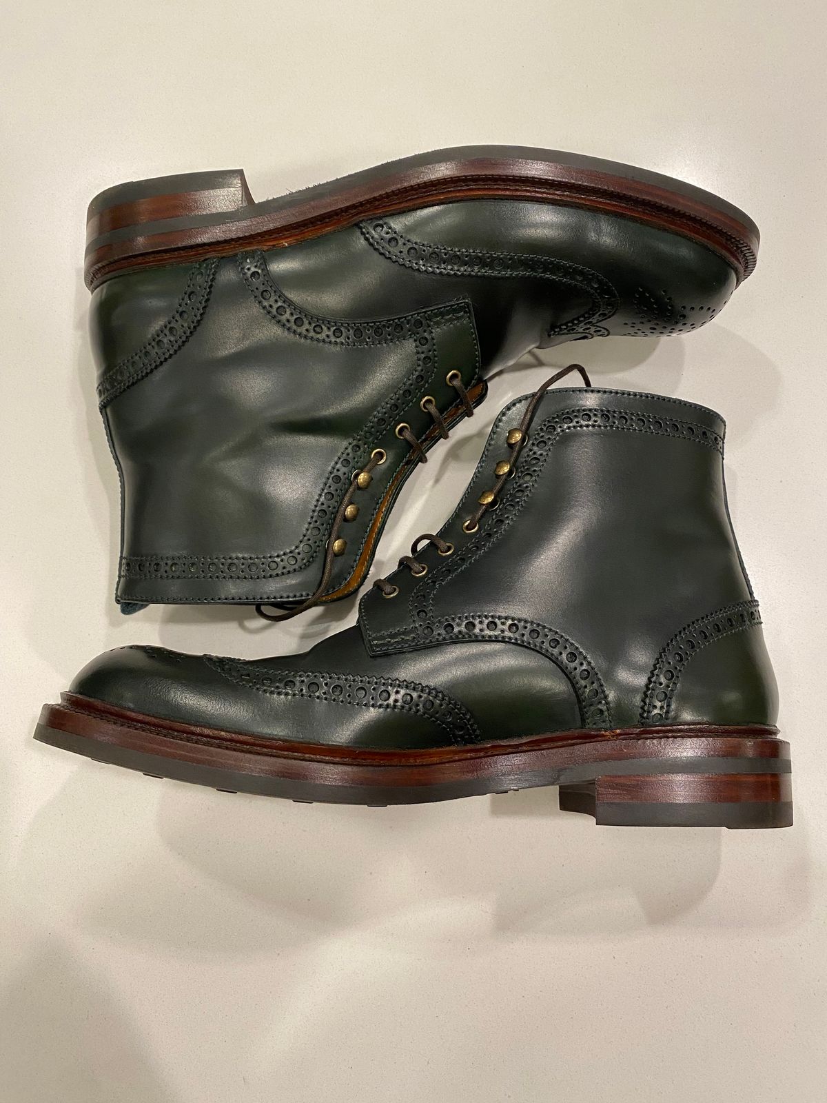 Photo by chris.8888 on June 11, 2025 of the Carmina Full-Brogue Jumper Boots 80277 in Horween Green Shell Cordovan.