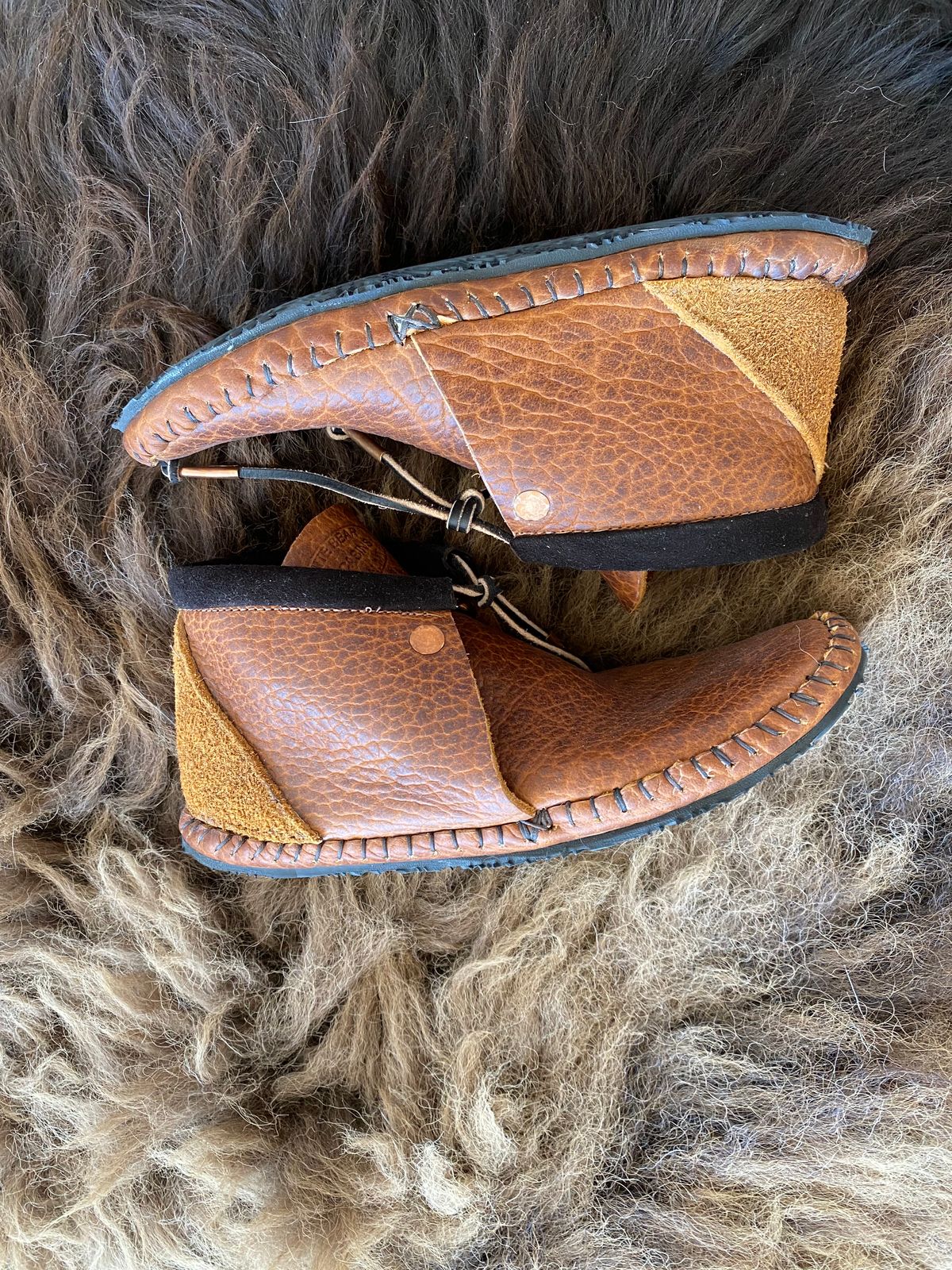 Photo by chris.8888 on March 12, 2025 of the White Bear Moccasins Tate Chukka in Law Tanning Cognac Big Horn Shrunken Bison.