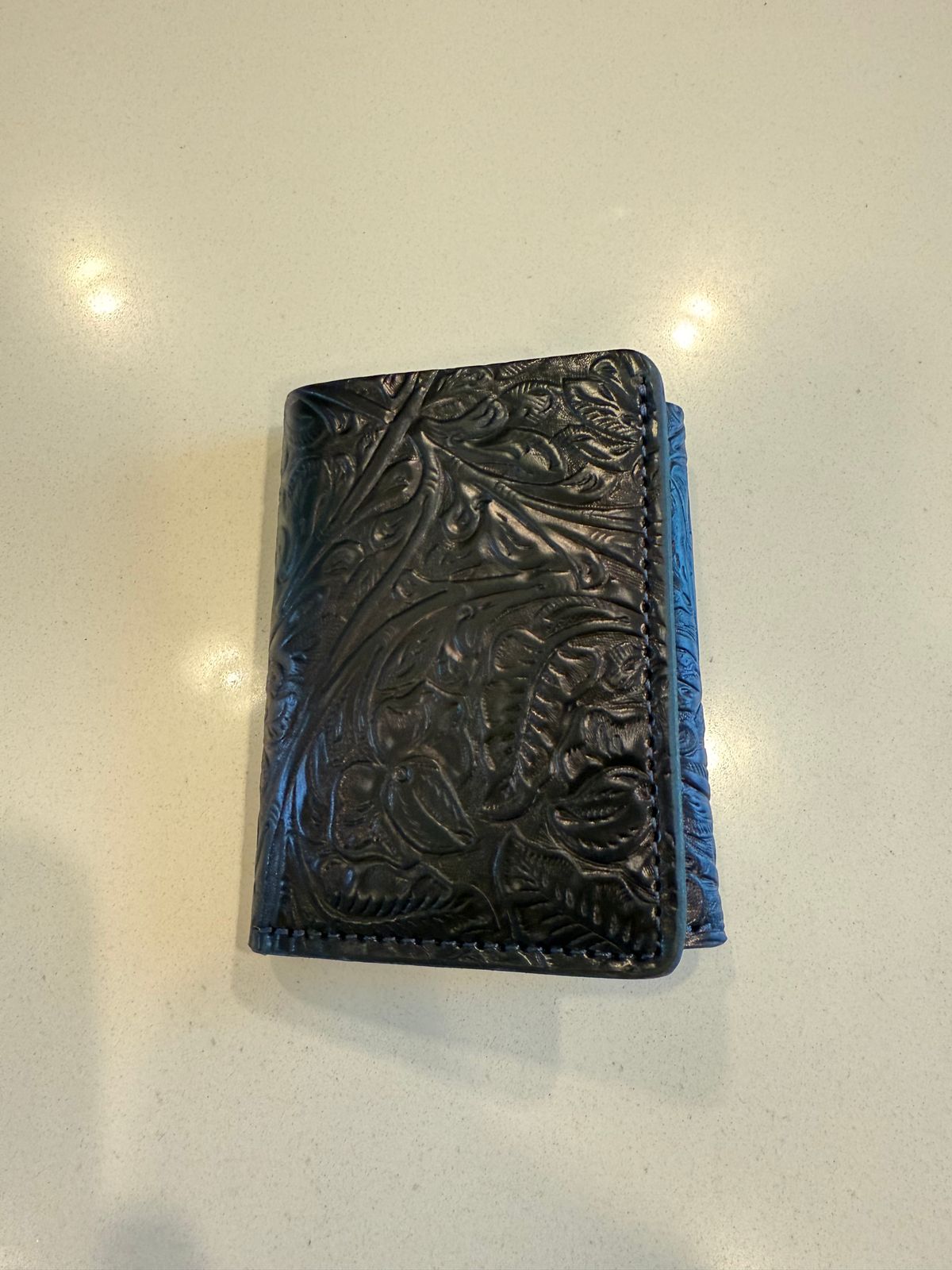 Photo by chris.8888 on August 12, 2025 of the Ashland Leather Trifold Wallet in Horween Black Floral Shell Cordovan.