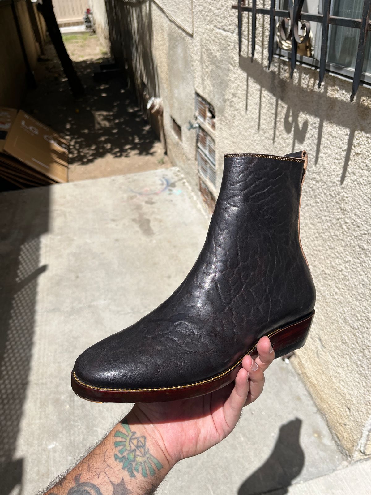 Photo by niku on May 15, 2025 of the Fortis Boots Antasena Wholecut Side-Zip in Maryam Horsebutt Washed Article with Black Overdye.
