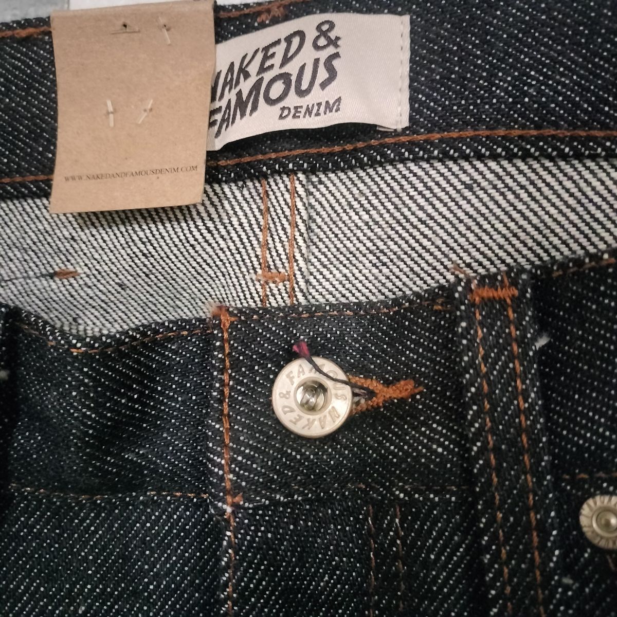 Photo by StuntTriple on October 21, 2025 of the Naked & Famous Denim Elephant 13 Red Core in Natural Vegetable Tan & 21oz Super Heavyweight Japanese Denim.