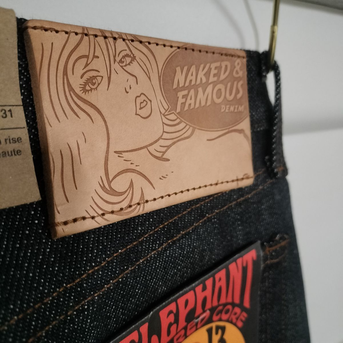 Photo by StuntTriple on October 21, 2025 of the Naked & Famous Denim Elephant 13 Red Core in Natural Vegetable Tan & 21oz Super Heavyweight Japanese Denim.