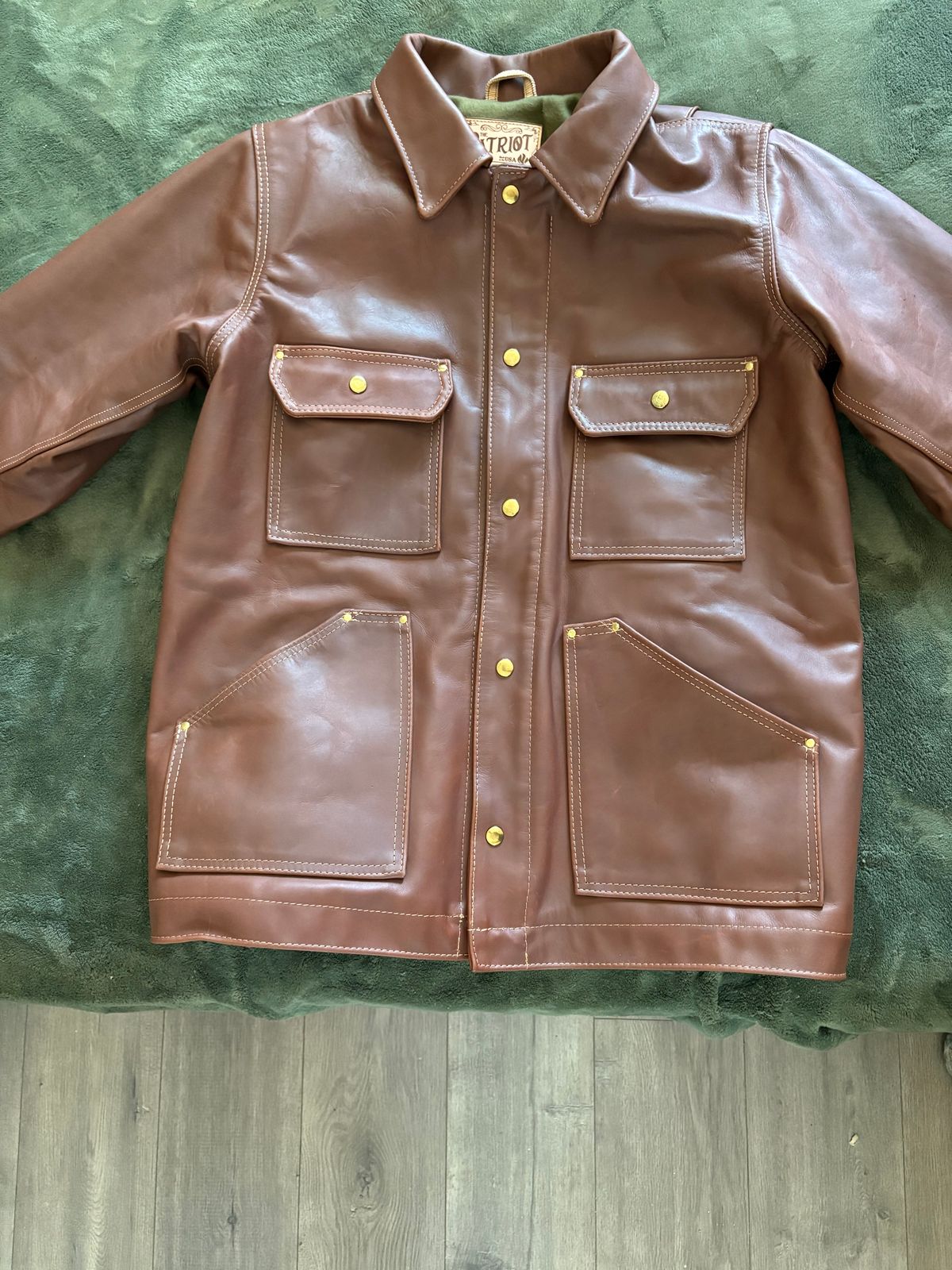 Photo by Eviejr on July 30, 2025 of the Heat Starps Leather Patriot Jacket in 1964 Brown.