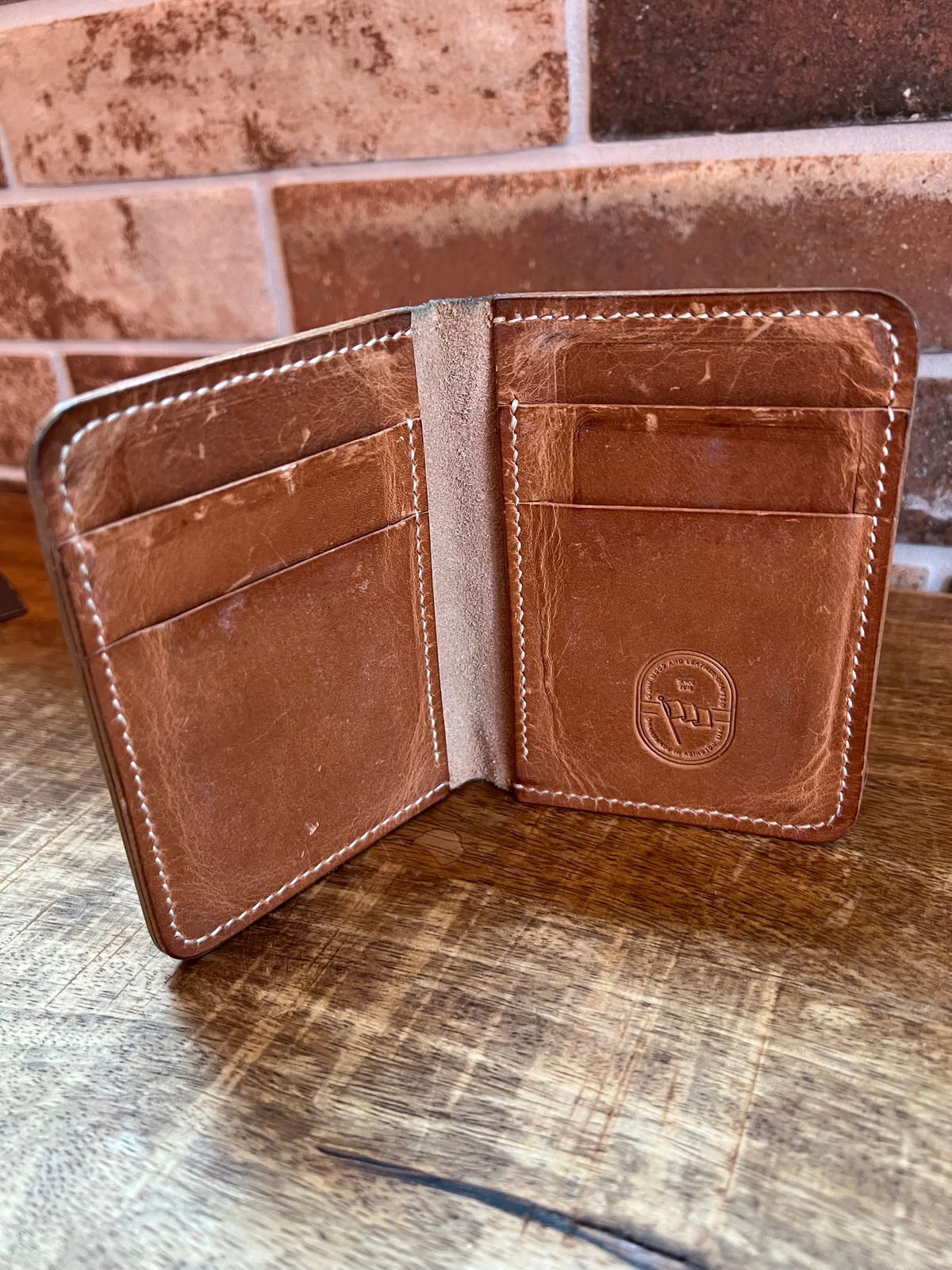 Photo by spiritualized50 on December 4, 2025 of the JHM Wood And Leather Crafts Vertical Wallet in Horween Natural Dublin.