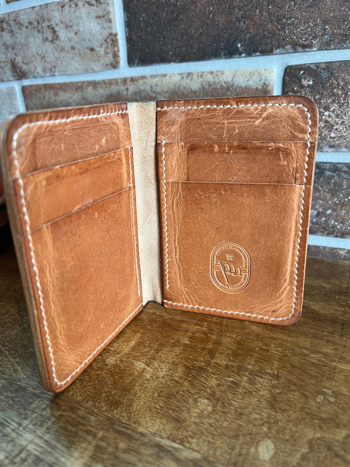Photo by spiritualized50 on January 3, 2026 of the JHM Wood And Leather Crafts Vertical Wallet in Horween Natural Dublin.