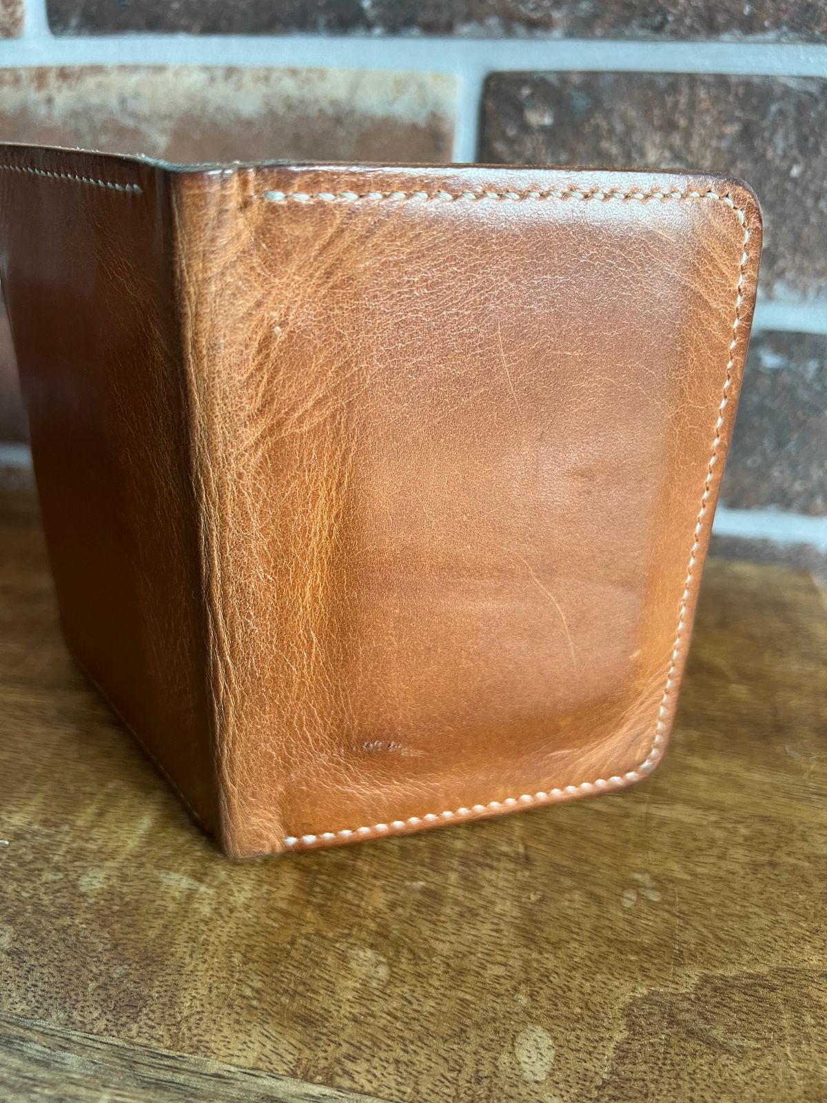 Photo by spiritualized50 on January 3, 2026 of the JHM Wood And Leather Crafts Vertical Wallet in Horween Natural Dublin.