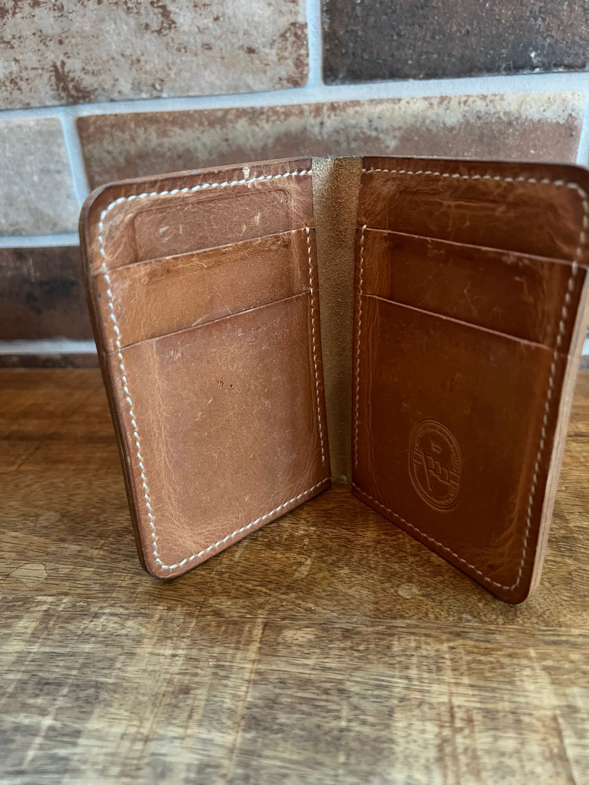Photo by spiritualized50 on February 5, 2026 of the JHM Wood And Leather Crafts Vertical Wallet in Horween Natural Dublin.