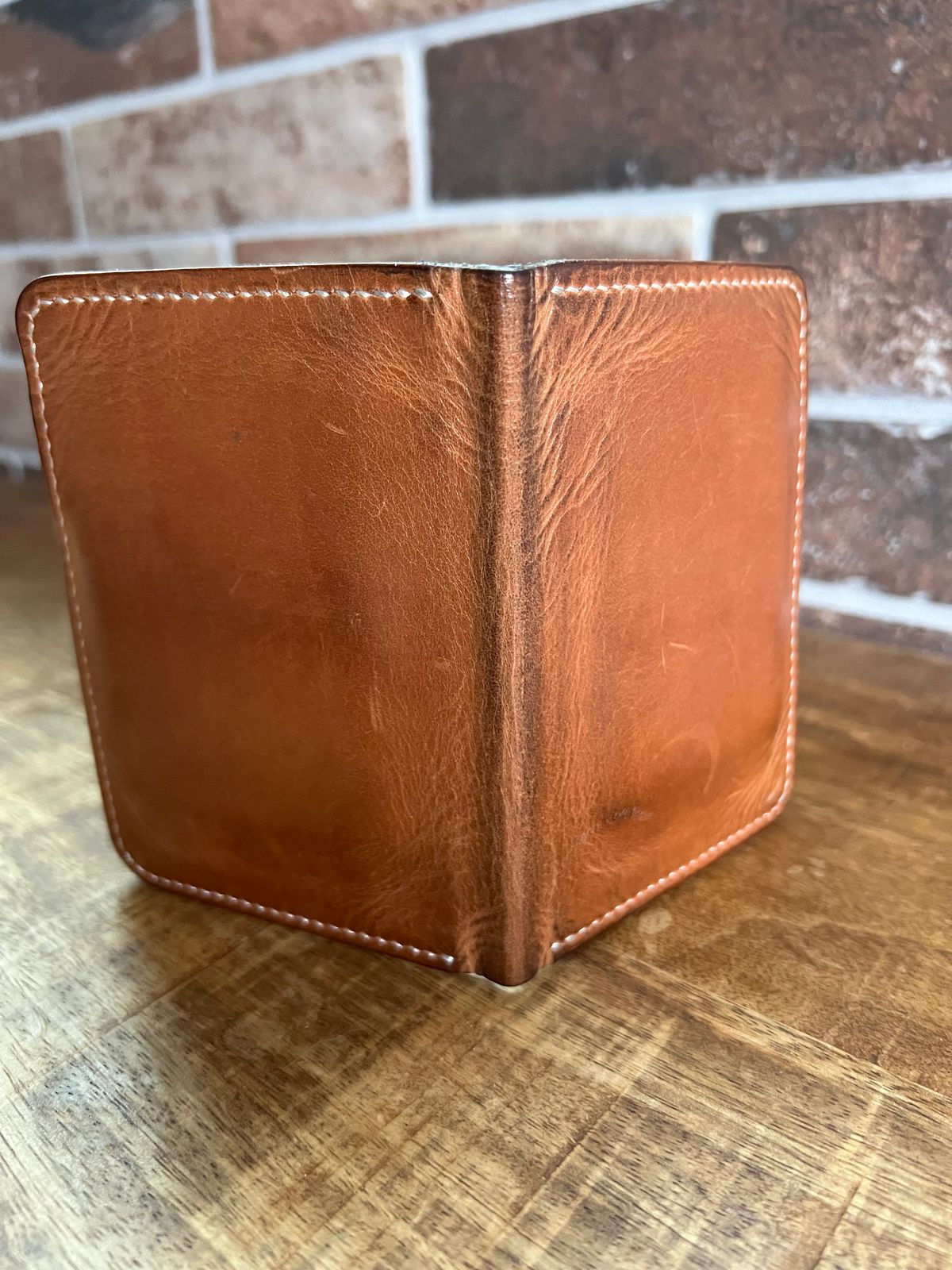 Photo by spiritualized50 on March 5, 2026 of the JHM Wood And Leather Crafts Vertical Wallet in Horween Natural Dublin.