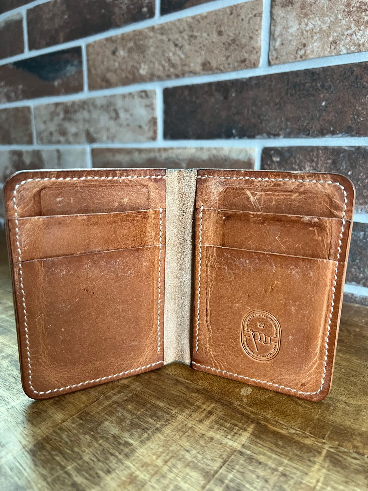 Photo by spiritualized50 on March 5, 2026 of the JHM Wood And Leather Crafts Vertical Wallet in Horween Natural Dublin.
