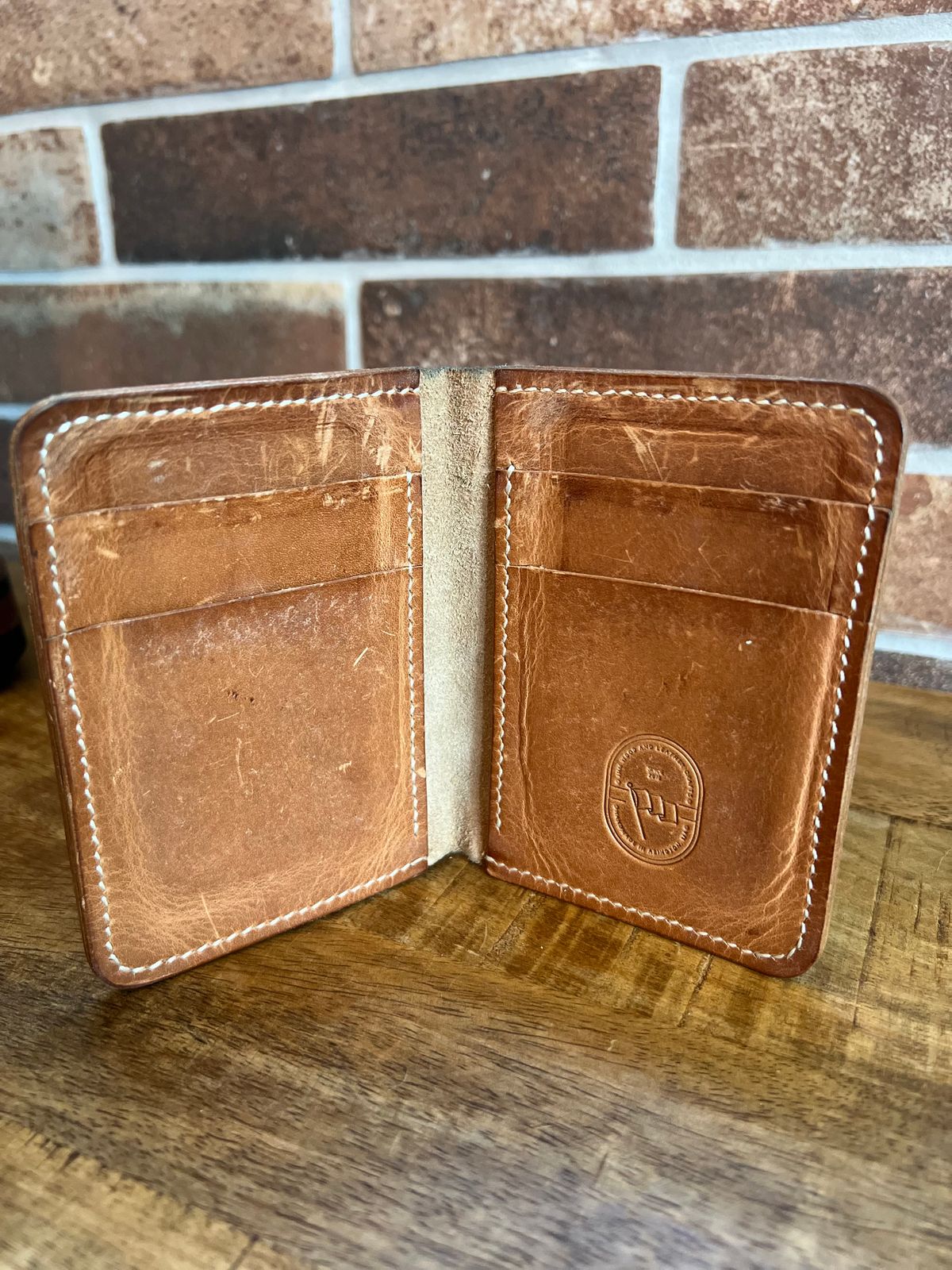 Photo by spiritualized50 on April 5, 2026 of the JHM Wood And Leather Crafts Vertical Wallet in Horween Natural Dublin.