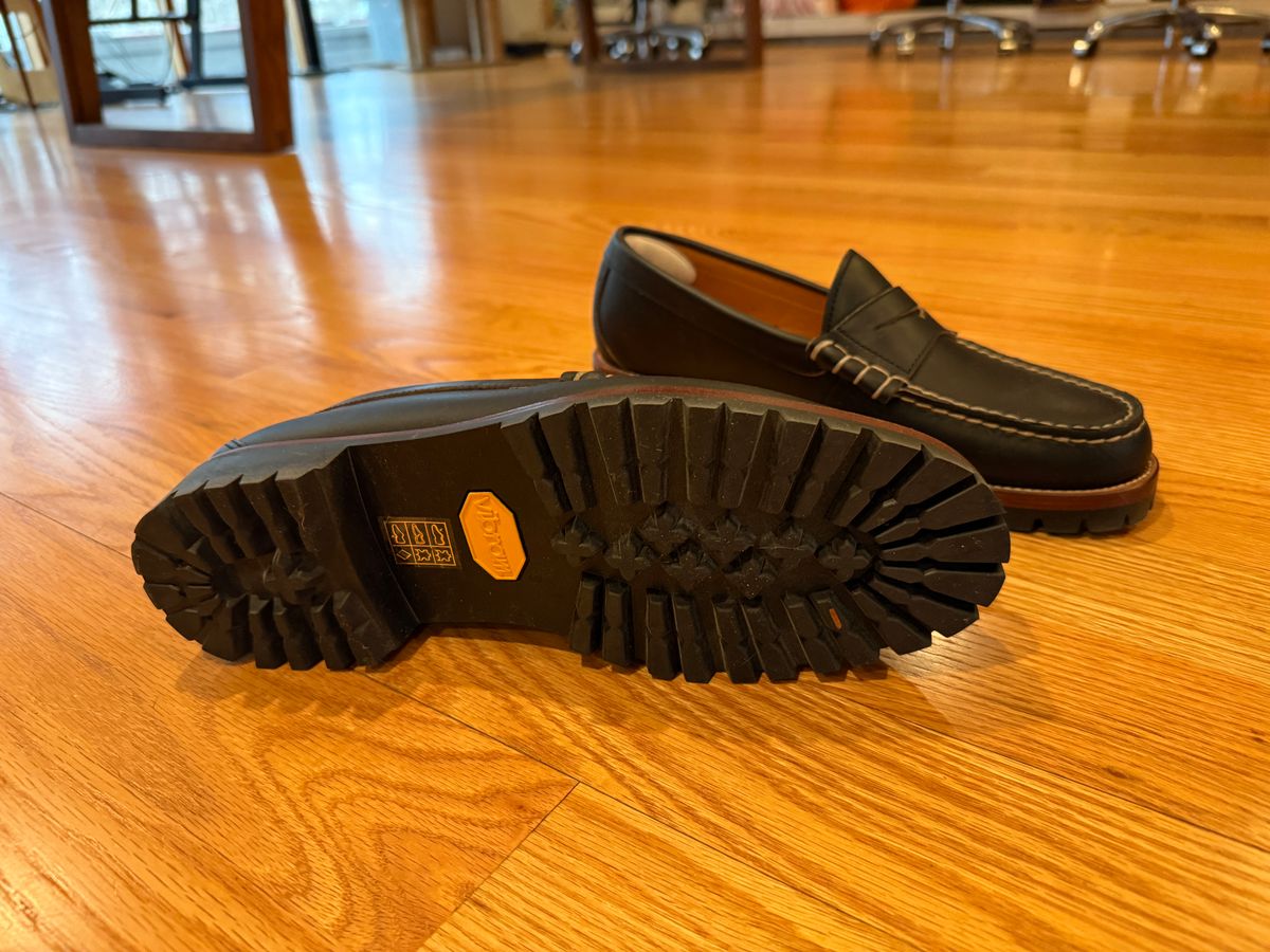 Photo by SYNTHESIZER on December 25, 2025 of the Brooks Brothers Penny Loafers in Undefined matte black Horween leather.