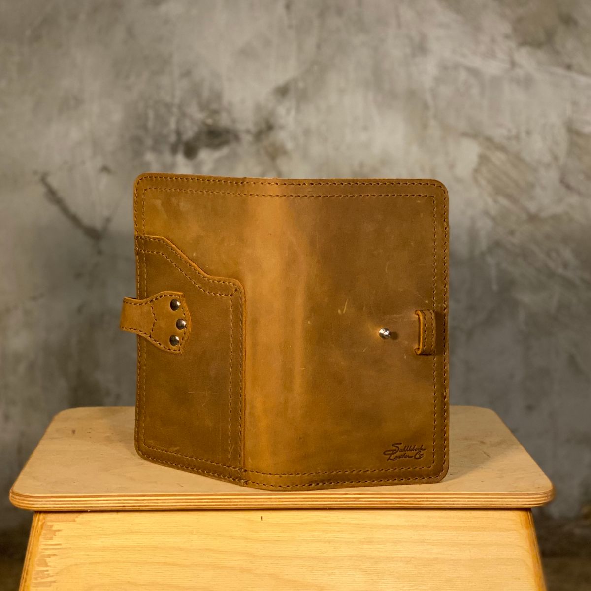 Photo by SerotinousCone on October 2, 2025 of the Saddleback Leather Co. Big Wallet in Tobacco.