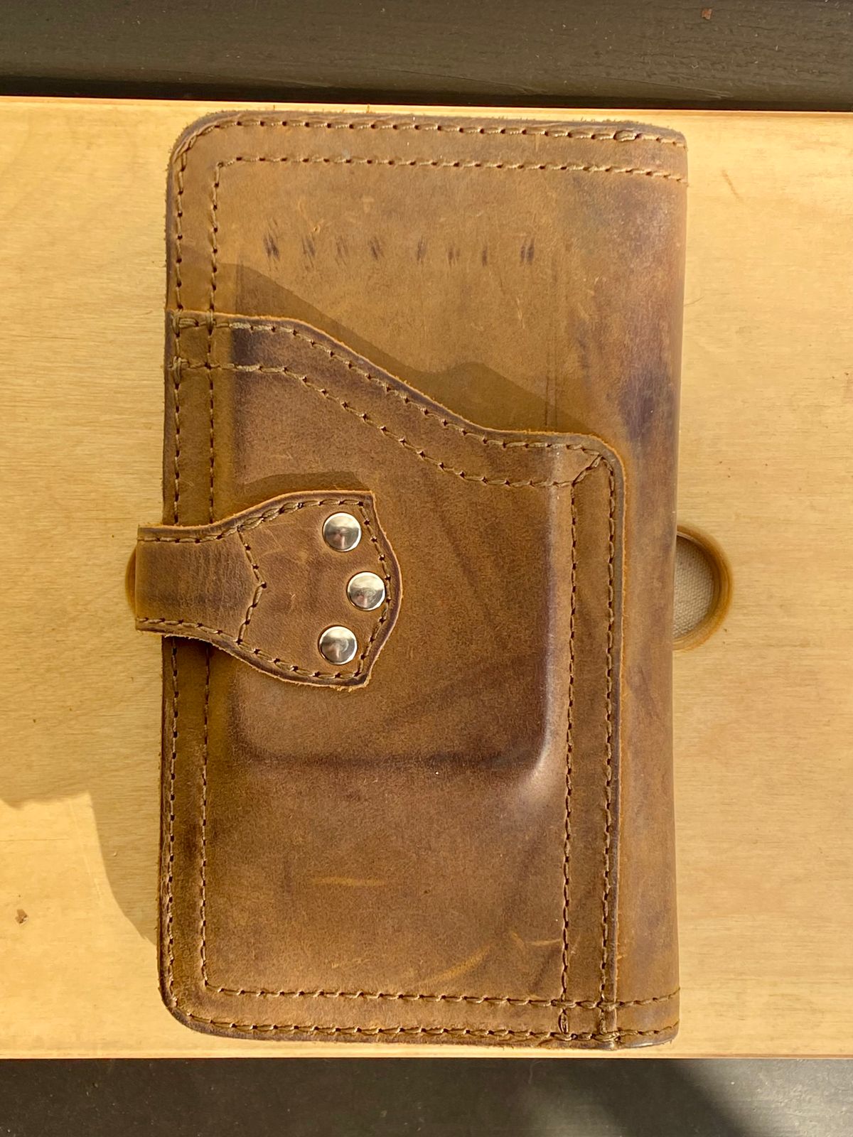 Photo by SerotinousCone on February 5, 2026 of the Saddleback Leather Co. Big Wallet in Tobacco.