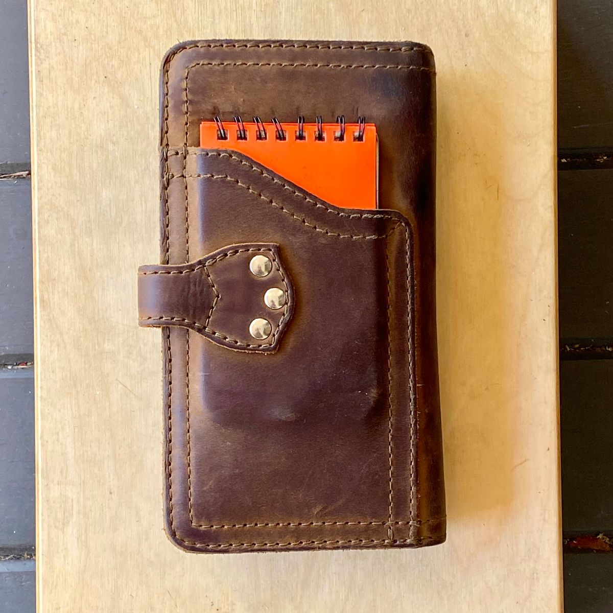 Photo by SerotinousCone on April 3, 2026 of the Saddleback Leather Co. Big Wallet in Tobacco.