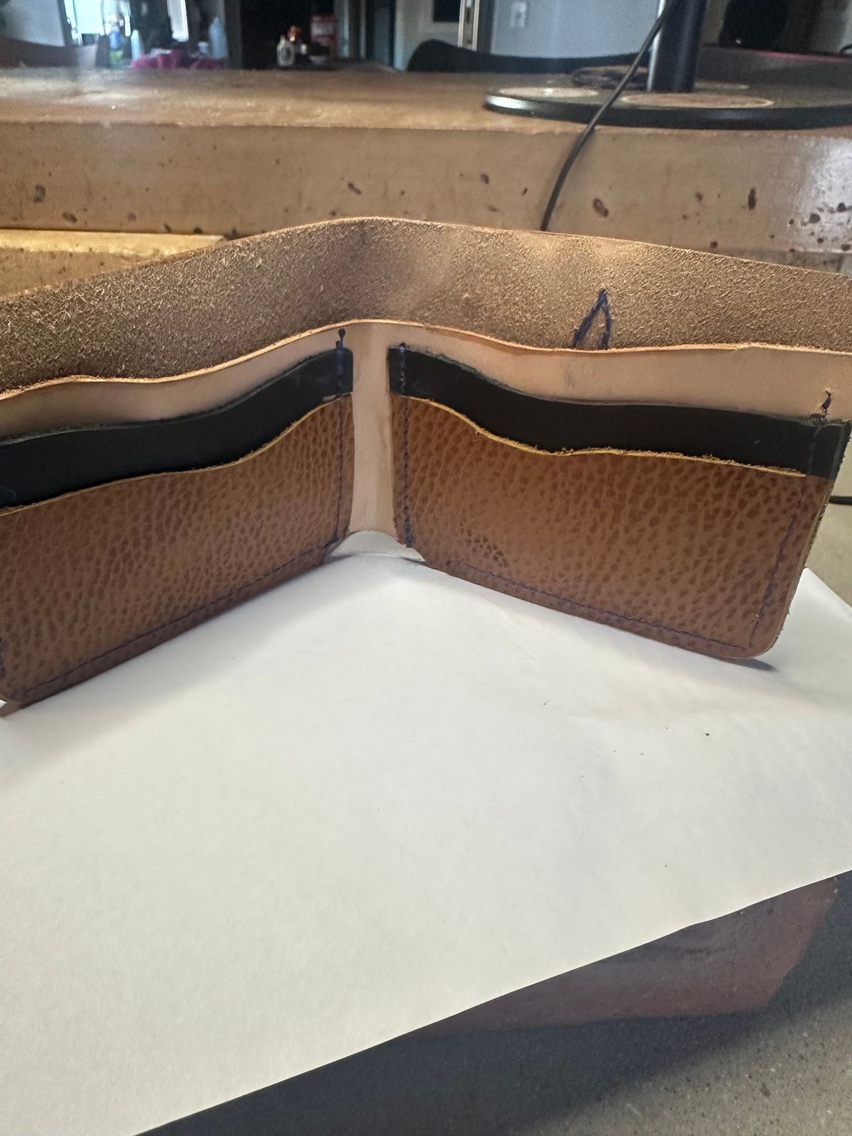Photo by rhinoaz on October 1, 2025 of the Rhino Kustomz Veg Tan Bi-fold in Hermann Oak Tooling Veg Tan.
