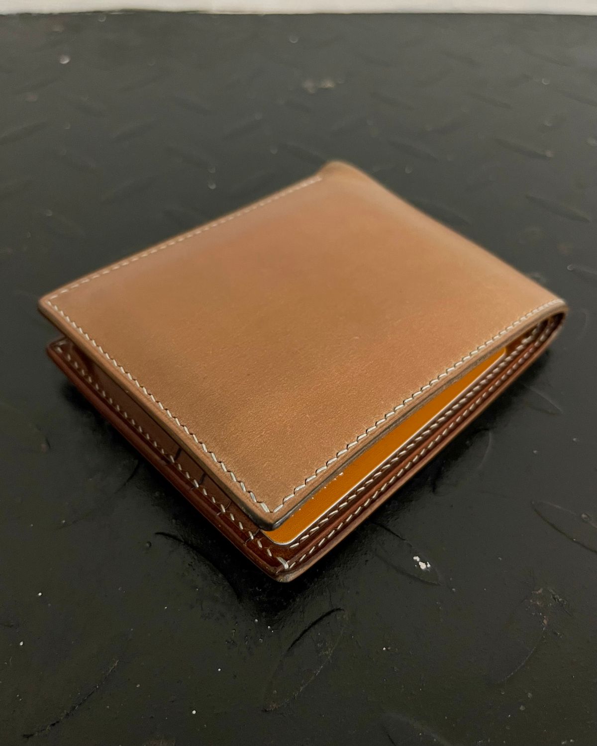 Photo by arnldkt on December 1, 2025 of the GitsiRosdiani Bifold Wallet in Shinki Natural Shell Cordovan & Conceria Walpier Brown Buttero.