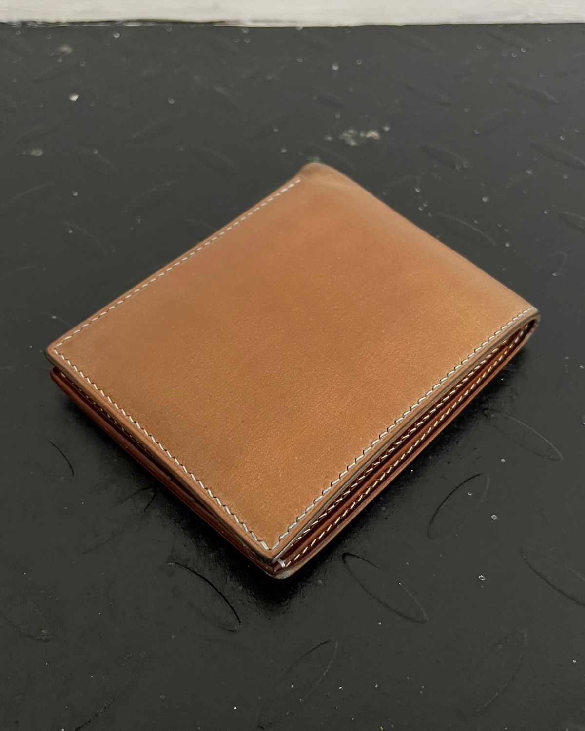 Photo by arnolddkoot on December 31, 2025 of the GitsiRosdiani Bifold Wallet in Shinki Natural Shell Cordovan & Conceria Walpier Brown Buttero.