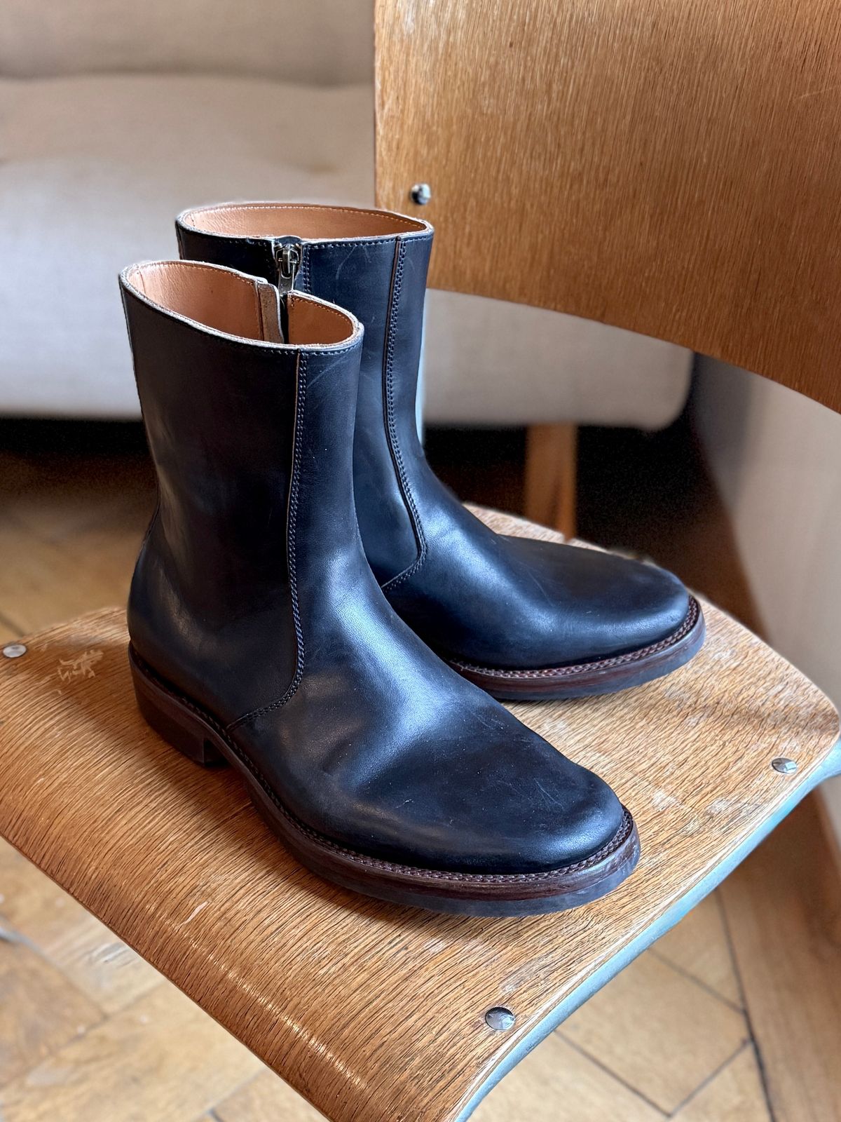 Photo by Sips on December 15, 2025 of the Flame Panda 8“ Zipper Boot in Maryam Natural Horsebutt Overdyed Brown then Black.