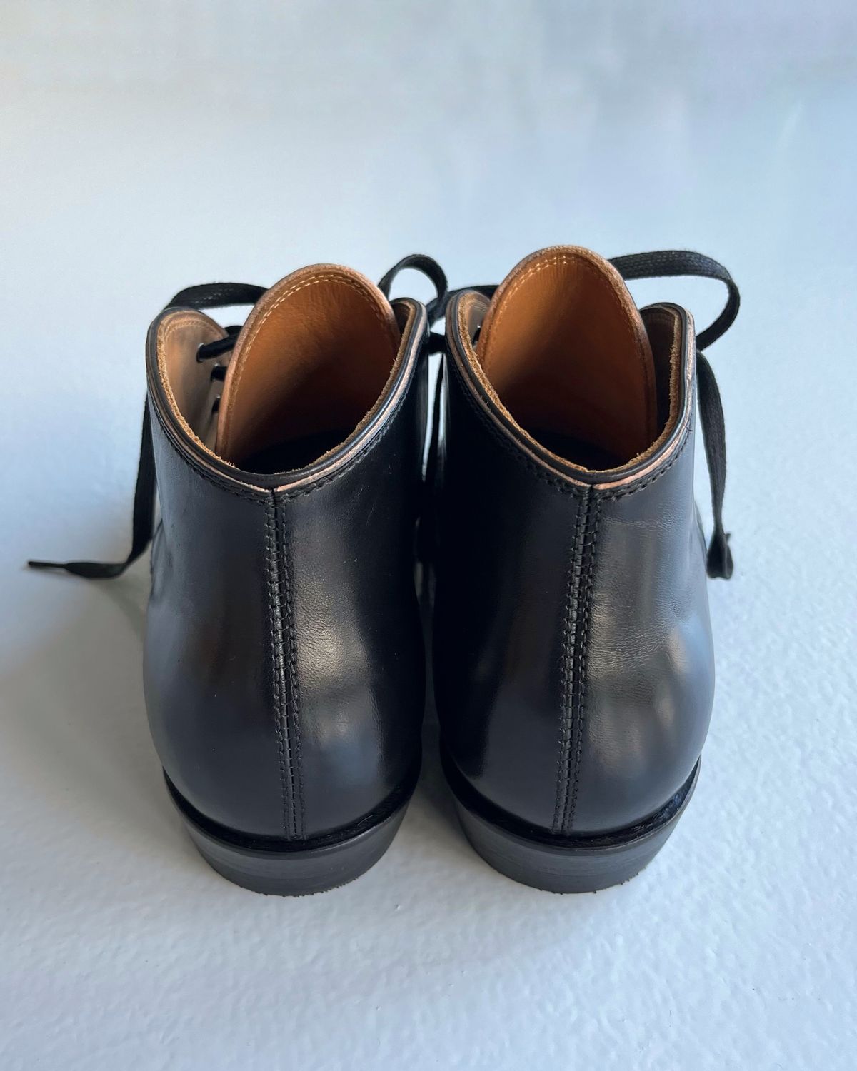 Photo by Sips on October 2, 2024 of the Flame Panda Chukkas in Maryam Natural Horsebutt Overdyed Brown then Black.