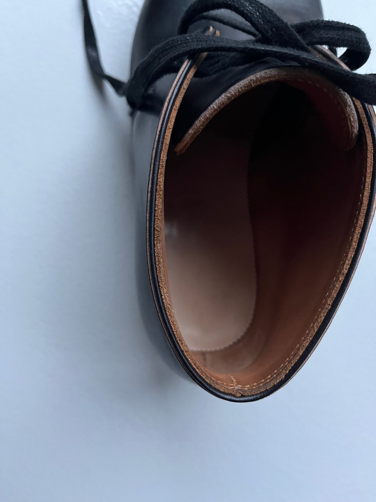 Photo by Sips on October 5, 2024 of the Flame Panda Chukkas in Maryam Natural Horsebutt Overdyed Brown then Black.