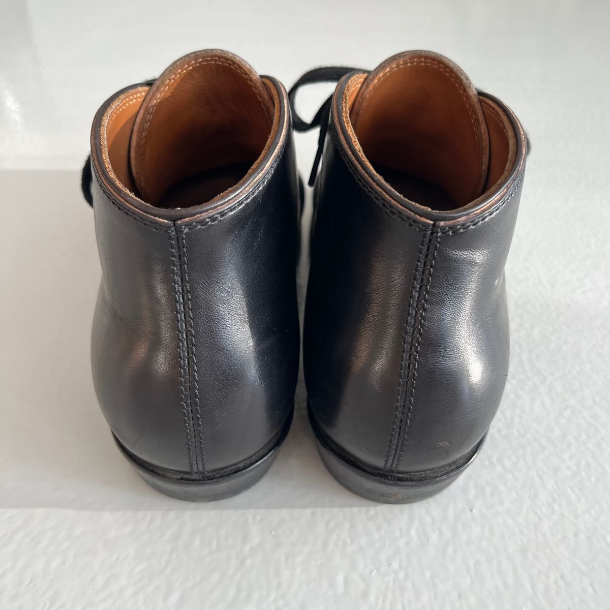 Photo by Sips on November 5, 2024 of the Flame Panda Chukkas in Maryam Natural Horsebutt Overdyed Brown then Black.