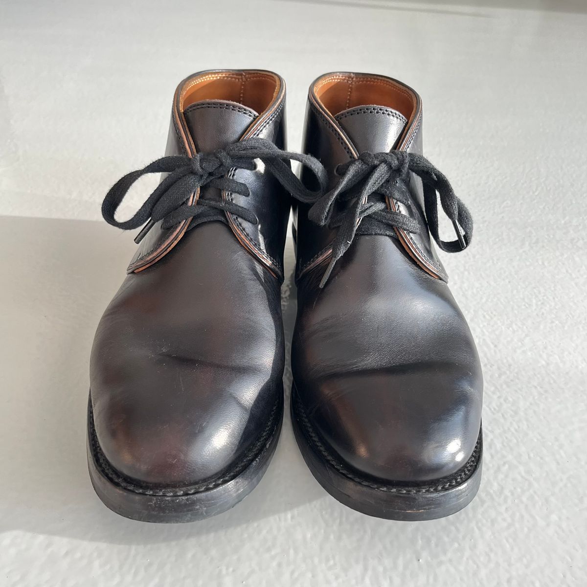 Photo by Sips on November 5, 2024 of the Flame Panda Chukkas in Maryam Natural Horsebutt Overdyed Brown then Black.