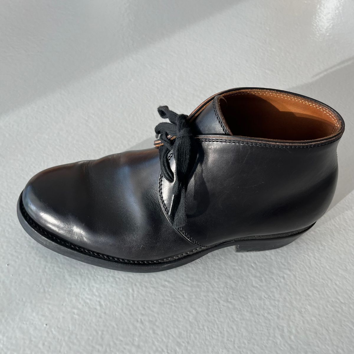 Photo by Sips on November 5, 2024 of the Flame Panda Chukkas in Maryam Natural Horsebutt Overdyed Brown then Black.